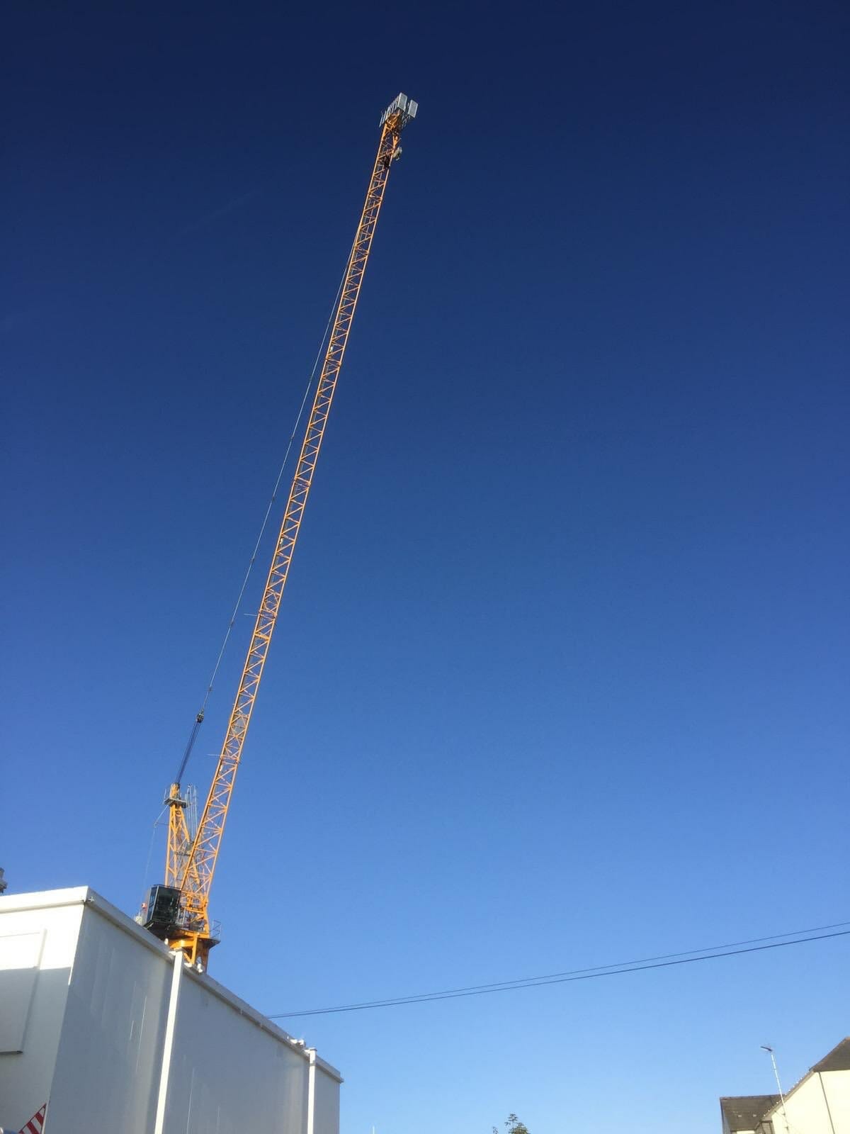 NEWS | Man climbs crane in Hereford
