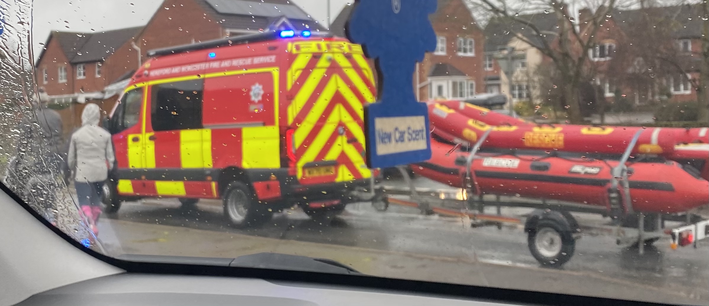 FLOODING | Emergency services called to car stuck in floodwater