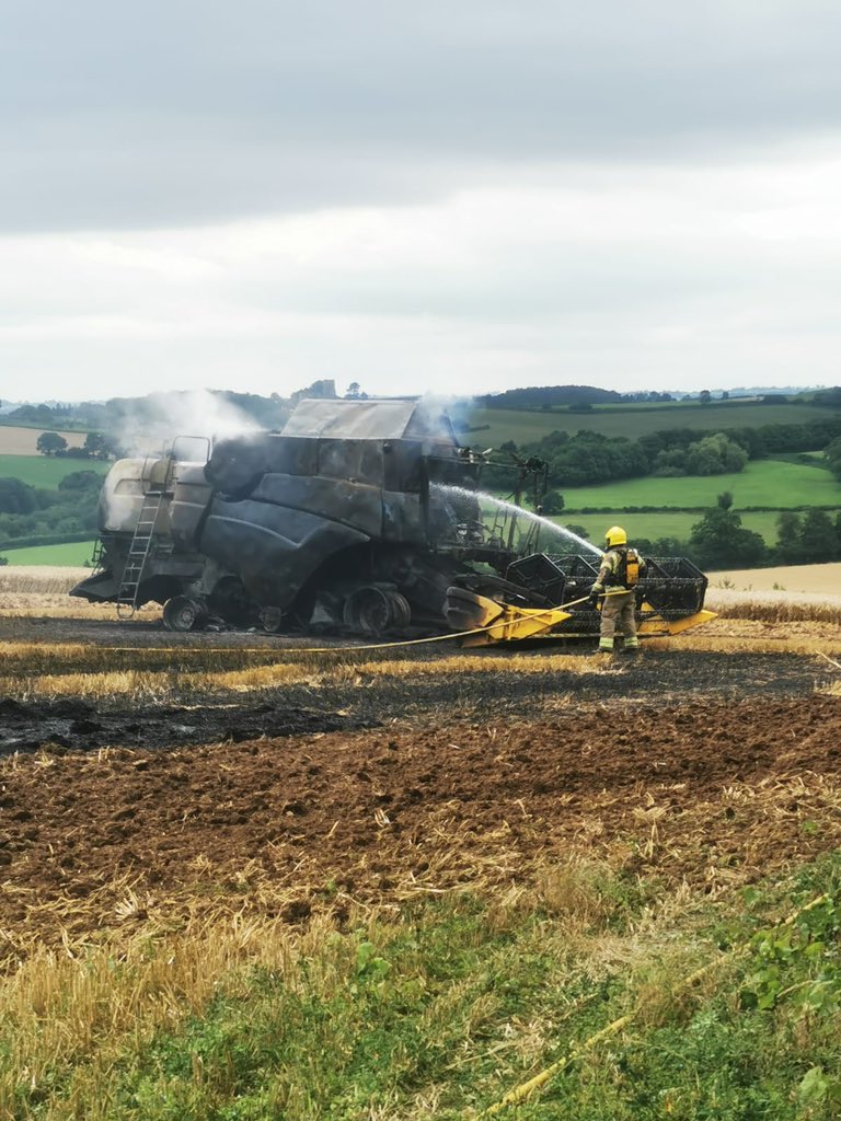 NEWS | Fire crews called after combine harvester ends up on fire