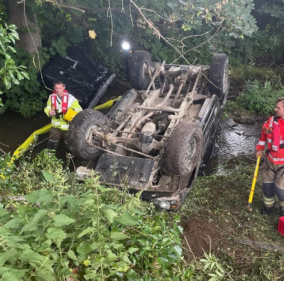 NEWS | Emergency services called after vehicle leaves the road and ends up upside down in a stream
