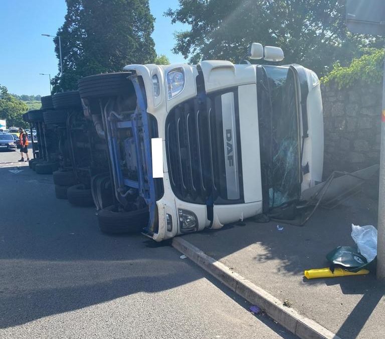 UK NEWS | Pedestrian incredibly lucky to survive after lorry overturned and landed on the pavement in South Wales 