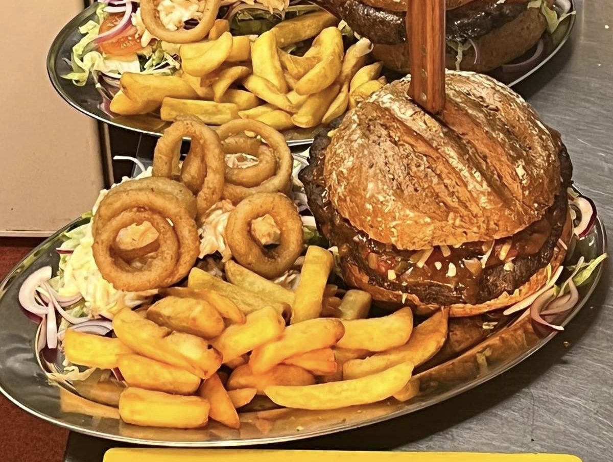 FEATURED | Are you brave enough to try the Big Ugly Burger Challenge that has defeated many people at this local restaurant / pub? Book NOW!